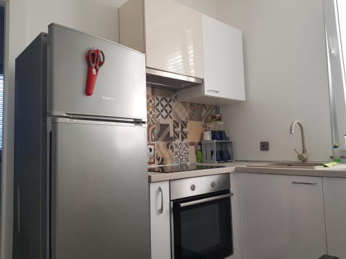 Kuchyň nebo kuchyňský kout v ubytování Apartment Leonardo