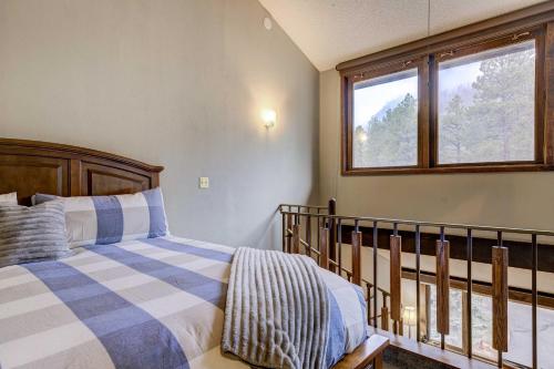 a bedroom with a bed and a window at Durango Lofted Studio about 9 Mi to Purgatory Resort! in Durango