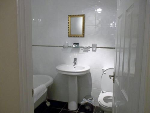 A bathroom at Roker Seafront Apartments