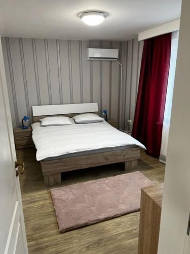 Postel nebo postele na pokoji v ubytování Apartament 9 Central