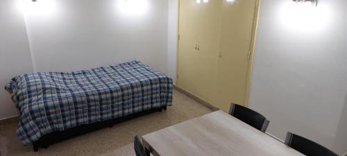 Tempat tidur dalam kamar di MDQ - Departamento - Pedro Luro