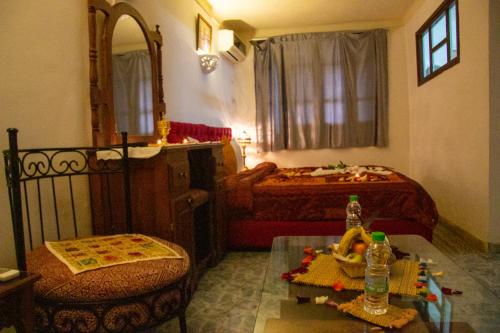 Postel nebo postele na pokoji v ubytování Riad Baba