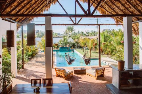 a view of a resort with a swimming pool at Casa Zala in El Paredón Buena Vista