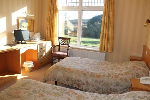 Postel nebo postele na pokoji v ubytování Riversdale Farm B&B