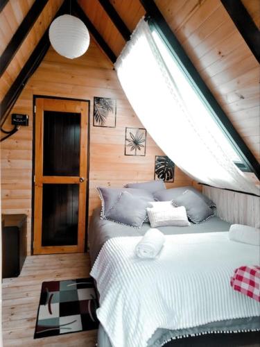 Voodi või voodid majutusasutuse Glamping refugio Gaia toas