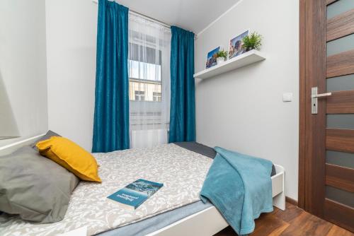Posteľ alebo postele v izbe v ubytovaní Apartament Sobieskiego 2 Parking gratiss