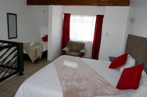 Ein Bett oder Betten in einem Zimmer der Unterkunft Sheba Rock Guesthouse