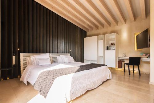 Hotel Rural Xerecaにあるベッド