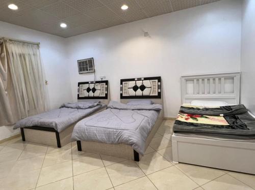 Кровать или кровати в номере Almazham holiday house