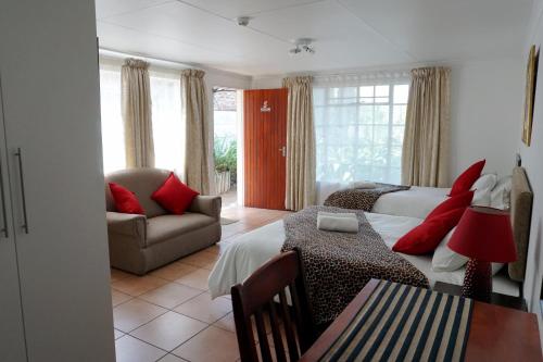 Ein Bett oder Betten in einem Zimmer der Unterkunft Sheba Rock Guesthouse