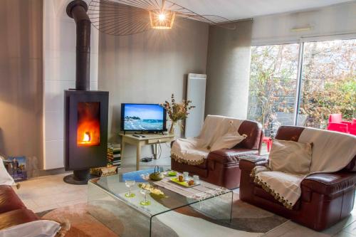 Photo de la galerie de l'établissement Maison à 1 minute à Pieds de la Plage ..., à Loctudy