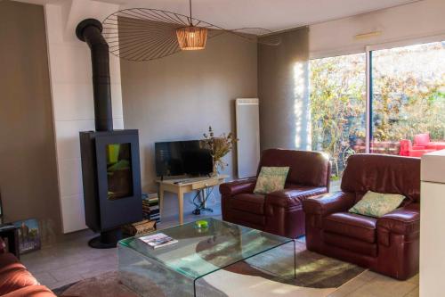 Photo de la galerie de l'établissement Maison à 1 minute à Pieds de la Plage ..., à Loctudy