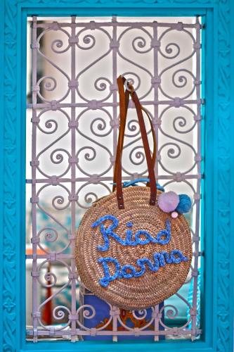 a bag with the words good morning hanging on a gate at Riad Darna in Tetouan