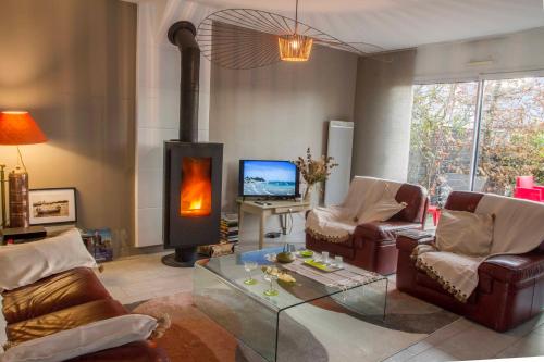 Photo de la galerie de l'établissement Maison à 1 minute à Pieds de la Plage ..., à Loctudy