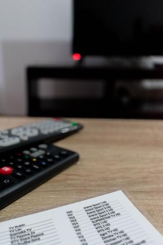 TV a/nebo společenská místnost v ubytování Vila MMBS