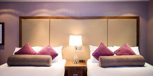 Sandman Signature London Gatwick Hotelにあるベッド