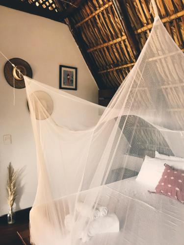 Una cama o camas en una habitación de Casa Zala