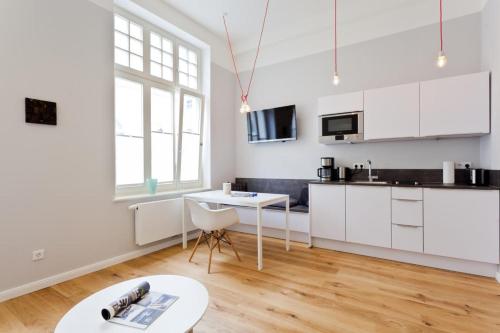 Kuchyň nebo kuchyňský kout v ubytování Soltausche Buchdruckerei - Whg 02