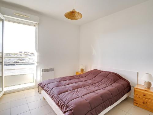 Ένα ή περισσότερα κρεβάτια σε δωμάτιο στο Bel appartement T3 à 50m de la plage, balcon, parking, pour 4 - FR-1-521-14