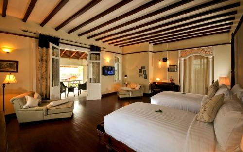 Ένα ή περισσότερα κρεβάτια σε δωμάτιο στο The Luang Say Residence