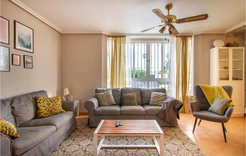 A seating area at 3 Bedroom Cozy Home In Orihuela