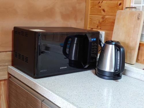 Estris per fer te o cafè a Geumok Log Pension