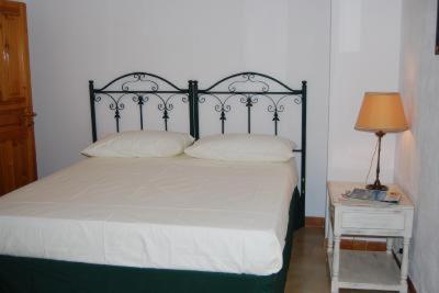 Ein Bett oder Betten in einem Zimmer der Unterkunft Casa Corte Giosuè Carducci
