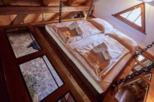 an overhead view of a bed in a room at Mill Apartments in Český Krumlov