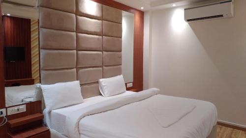 Postel nebo postele na pokoji v ubytování Hotel RIVERB