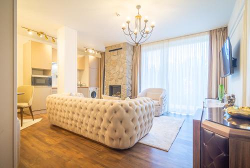 TV in/ali zabaviščno središče v nastanitvi APLEND Hotel Ovruč