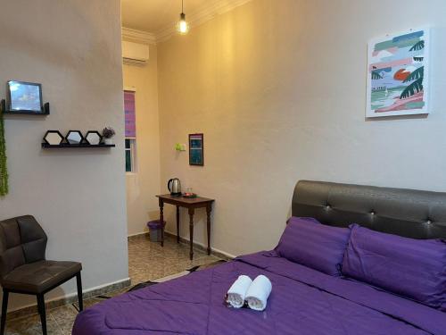 Postel nebo postele na pokoji v ubytování BASAR HOUSE SUITES RHU 10/ PENARIK