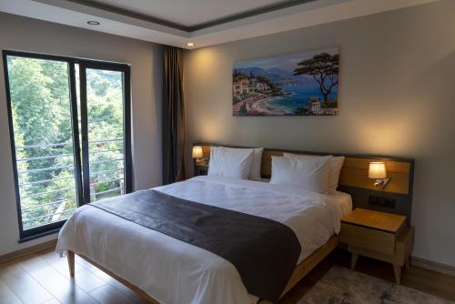 Katil atau katil-katil dalam bilik di Şehrar Suite Hotel