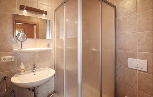 a bathroom with a shower and a sink at Awesome Home In Dalaas With 2 Bedrooms And Wifi in Dalaas