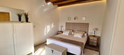 Posteľ alebo postele v izbe v ubytovaní Casa deMáximo
