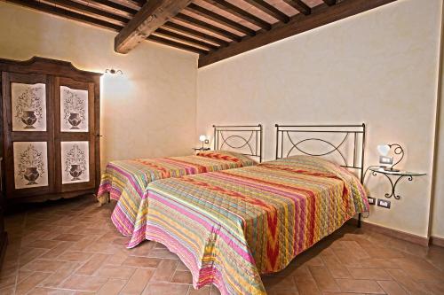 Katil atau katil-katil dalam bilik di Casa Sandro a Podere Pascianella