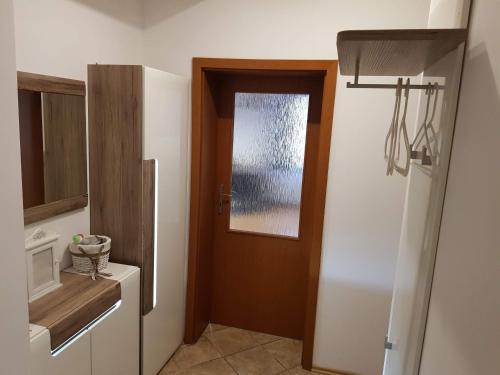 Et badeværelse på Luxury apartment with Swimming pool , Lovely Garden , BBQ place