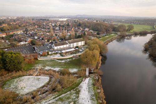 an aerial view of a town next to a river at Riverside Hotel by Chef & Brewer Collection in Burton upon Trent