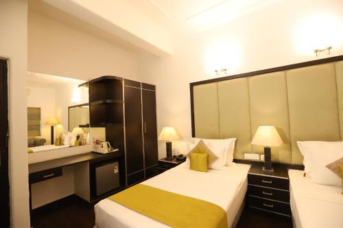 Katil atau katil-katil dalam bilik di Hotel Capitol Hills - Greater Kailash Delhi