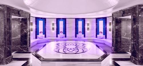 a lobby with a mandala in the middle of a room at The Green Park Pendik in Istanbul