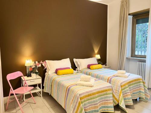 Ένα ή περισσότερα κρεβάτια σε δωμάτιο στο Bnbook-Via Torino Train Station