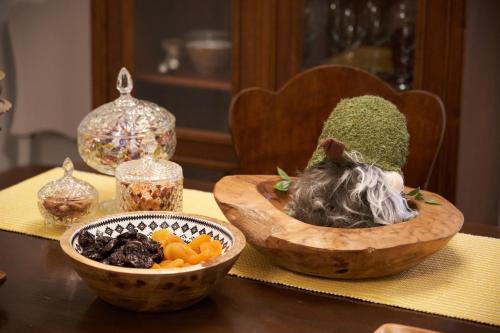 two bowls of food sitting on a table at Dandy Villas Dimitsana - a family ideal charming home in a quaint historic neighborhood - 2 fireplaces for romantic nights in Dhimitsana