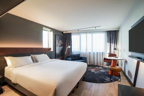 Кровать или кровати в номере Mercure Amsterdam City Hotel