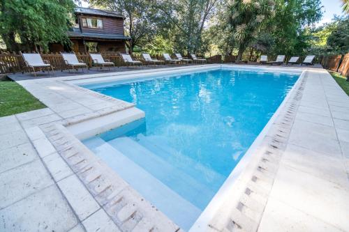 Bazén v ubytování Cabañas y Spa Las Pircas nebo v jeho okolí