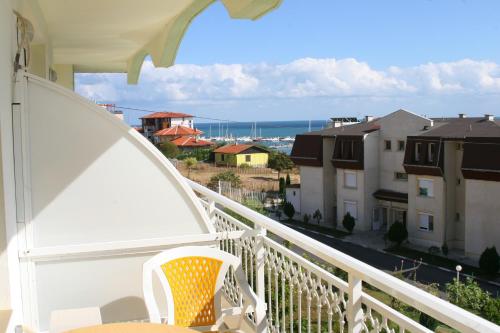 a balcony with a view of the ocean at Hotel Panorama in Sveti Vlas
