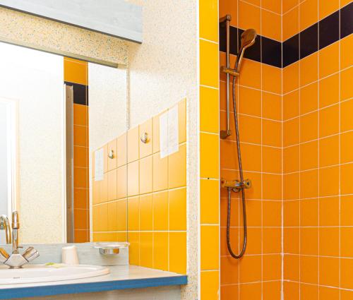 Koupelna v ubytování Le CESAR HOTEL
