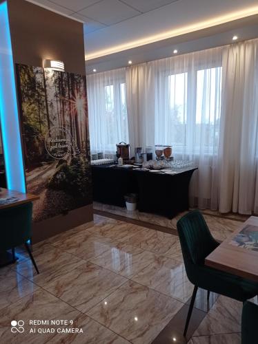 Posezení v ubytování Apartamenty-Europejska