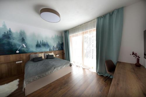 Apartmán Snowにあるベッド