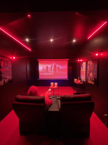 Suite cinéma et jacuzzi privé