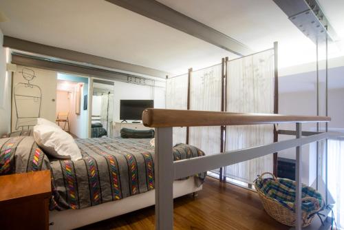 Posteľ alebo postele v izbe v ubytovaní Loft in Testaccio