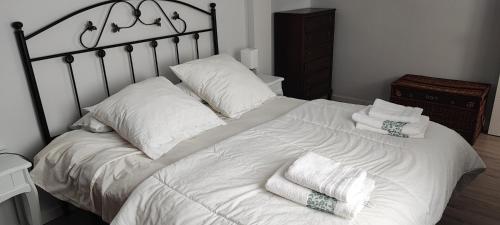 A bed or beds in a room at Piso céntrico ideal